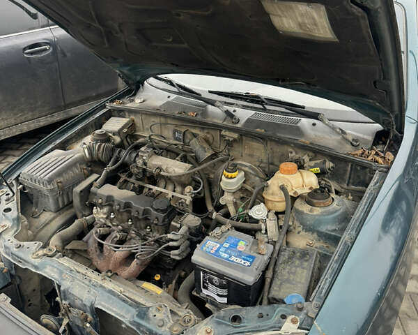 Зелений Деу Ланос, об'ємом двигуна 1.5 л та пробігом 200 тис. км за 999 $, фото 7 на Automoto.ua