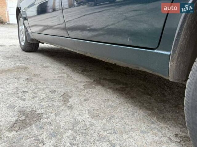 Зеленый Дэу Ланос, объемом двигателя 1.5 л и пробегом 250 тыс. км за 2900 $, фото 6 на Automoto.ua