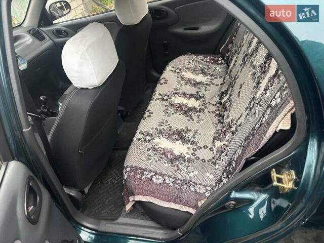 Зеленый Дэу Ланос, объемом двигателя 1.5 л и пробегом 154 тыс. км за 3600 $, фото 8 на Automoto.ua