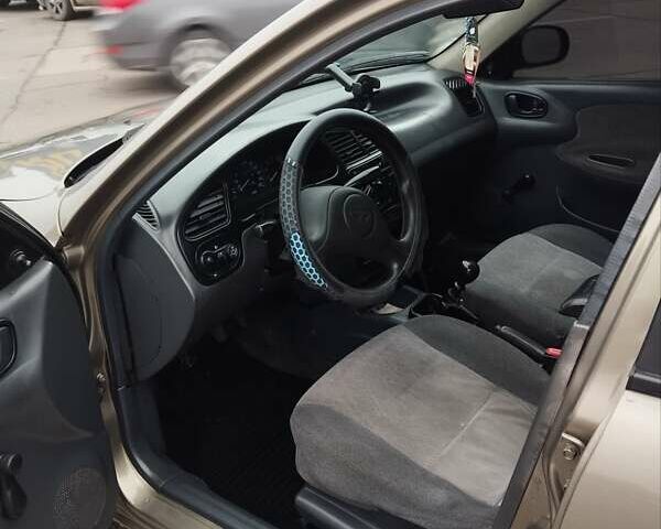 Зеленый Дэу Ланос, объемом двигателя 1.5 л и пробегом 239 тыс. км за 2500 $, фото 2 на Automoto.ua