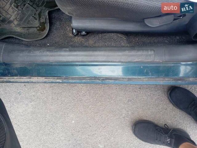 Зелений Деу Ланос, об'ємом двигуна 1.35 л та пробігом 245 тис. км за 900 $, фото 2 на Automoto.ua
