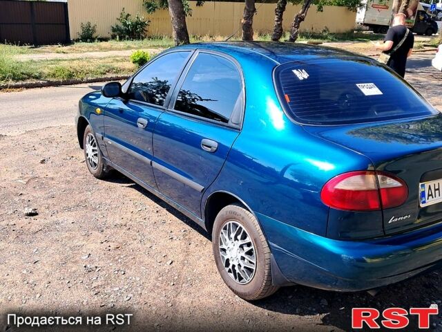 Зеленый Дэу Ланос, объемом двигателя 1.5 л и пробегом 215 тыс. км за 2600 $, фото 3 на Automoto.ua