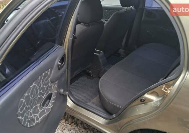 Зеленый Дэу Ланос, объемом двигателя 1.5 л и пробегом 190 тыс. км за 2450 $, фото 7 на Automoto.ua