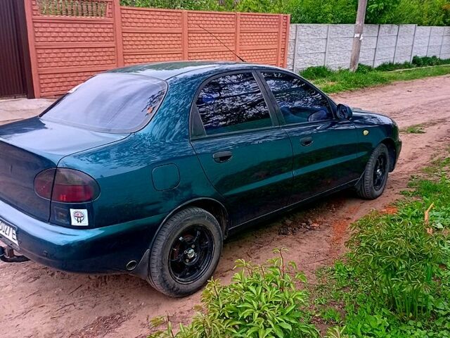 Дэу Ланос 2004 в Харькове на Automoto.ua Зеленый Дэу Ланос, объемом двигателя 1.5 л и пробегом 350 тыс. км за 2550 $, фото 3 на Automoto.ua