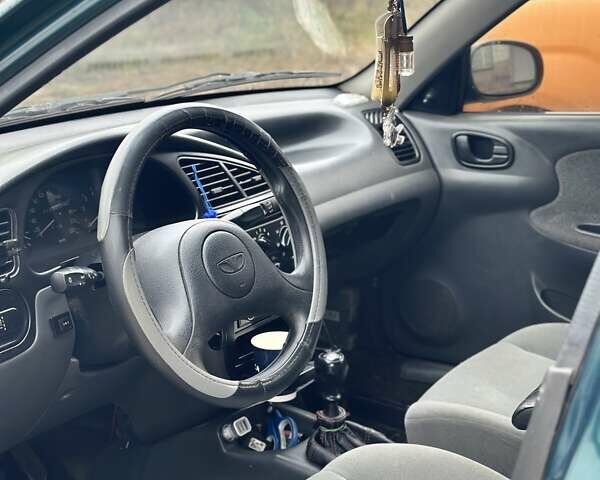 Зеленый Дэу Ланос, объемом двигателя 1.5 л и пробегом 425 тыс. км за 2400 $, фото 5 на Automoto.ua