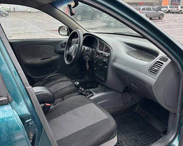 Зелений Деу Ланос, об'ємом двигуна 1.5 л та пробігом 256 тис. км за 1950 $, фото 7 на Automoto.ua