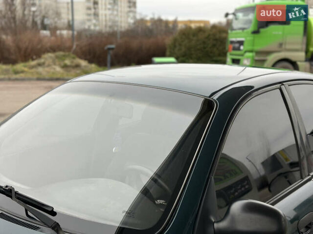 Зелений Деу Ланос, об'ємом двигуна 1.5 л та пробігом 241 тис. км за 2250 $, фото 8 на Automoto.ua