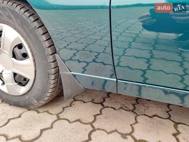 Зеленый Дэу Ланос, объемом двигателя 1.5 л и пробегом 185 тыс. км за 2750 $, фото 8 на Automoto.ua