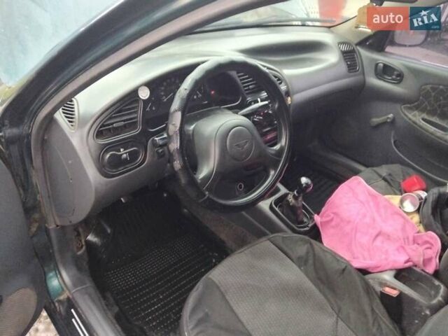 Дэу Ланос 2004 в Полтаве на Automoto.ua Зеленый Дэу Ланос, объемом двигателя 1.5 л и пробегом 200 тыс. км за 1850 $, фото 6 на Automoto.ua