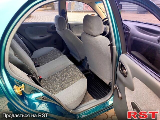 Зеленый Дэу Ланос, объемом двигателя 1.5 л и пробегом 185 тыс. км за 2750 $, фото 7 на Automoto.ua