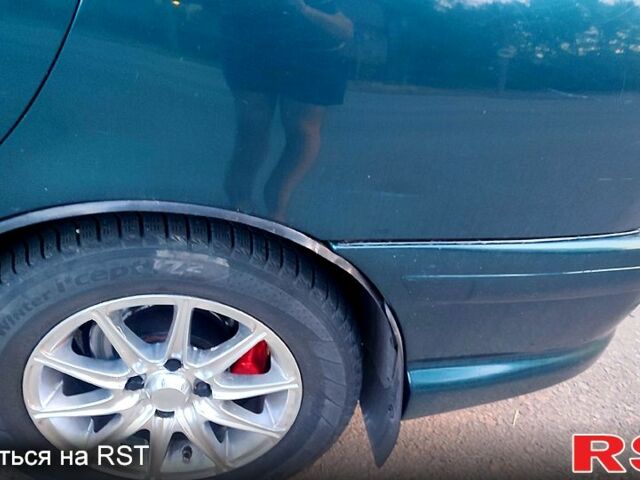 Зеленый Дэу Ланос, объемом двигателя 1.4 л и пробегом 200 тыс. км за 2100 $, фото 3 на Automoto.ua