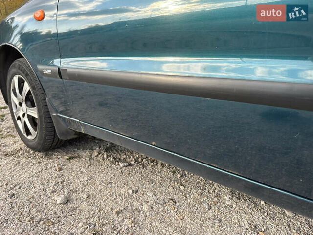 Зелений Деу Ланос, об'ємом двигуна 1.5 л та пробігом 324 тис. км за 2800 $, фото 4 на Automoto.ua