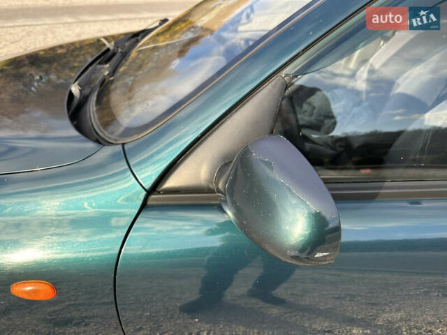 Зелений Деу Ланос, об'ємом двигуна 1.5 л та пробігом 324 тис. км за 2800 $, фото 14 на Automoto.ua