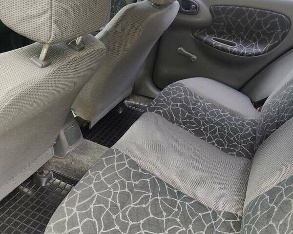 Зеленый Дэу Ланос, объемом двигателя 1.5 л и пробегом 123 тыс. км за 1850 $, фото 7 на Automoto.ua