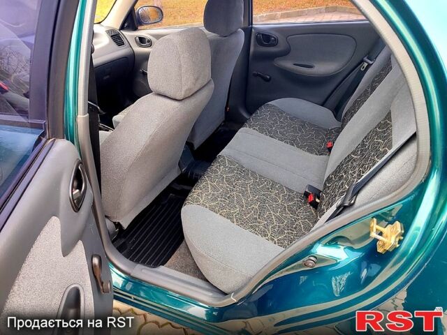 Зеленый Дэу Ланос, объемом двигателя 1.5 л и пробегом 185 тыс. км за 2750 $, фото 5 на Automoto.ua