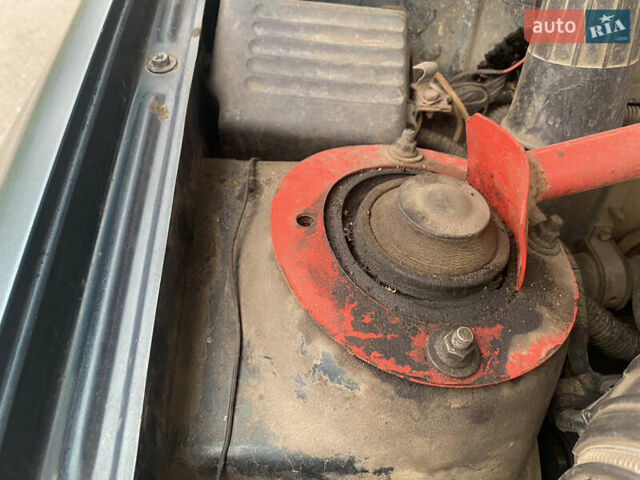 Зеленый Дэу Ланос, объемом двигателя 1.5 л и пробегом 183 тыс. км за 2000 $, фото 4 на Automoto.ua