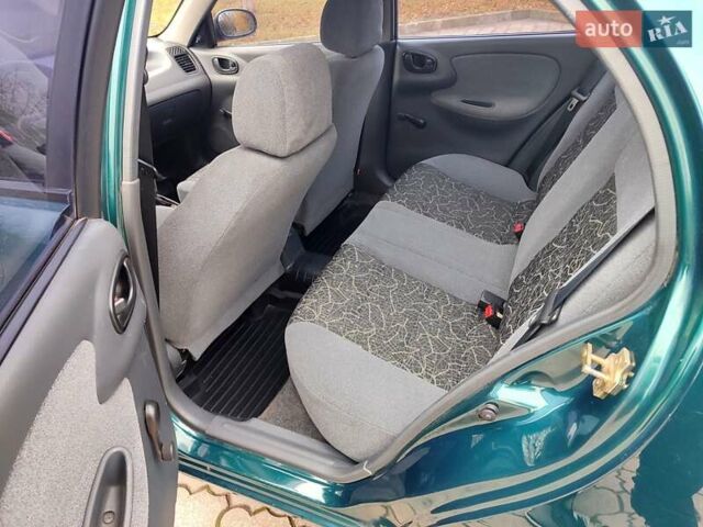 Зеленый Дэу Ланос, объемом двигателя 1.5 л и пробегом 185 тыс. км за 2750 $, фото 19 на Automoto.ua