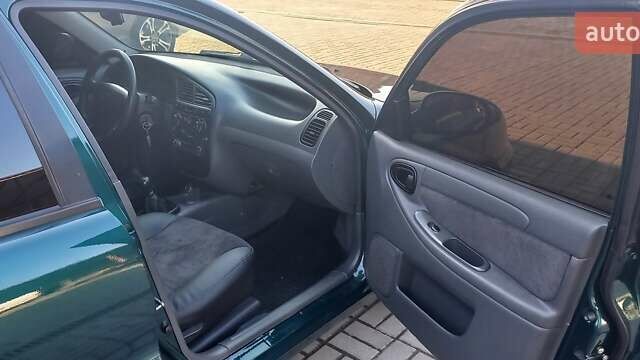 Зелений Деу Ланос, об'ємом двигуна 1.5 л та пробігом 300 тис. км за 4200 $, фото 10 на Automoto.ua