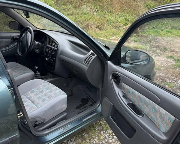 Зелений Деу Ланос, об'ємом двигуна 1.5 л та пробігом 250 тис. км за 2100 $, фото 8 на Automoto.ua