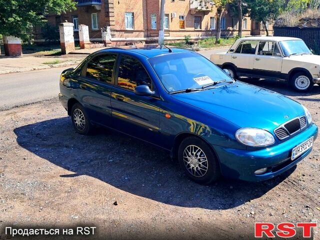 Зеленый Дэу Ланос, объемом двигателя 1.5 л и пробегом 215 тыс. км за 2600 $, фото 1 на Automoto.ua