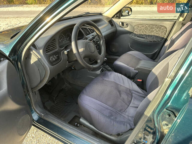 Зелений Деу Ланос, об'ємом двигуна 1.5 л та пробігом 324 тис. км за 2800 $, фото 7 на Automoto.ua