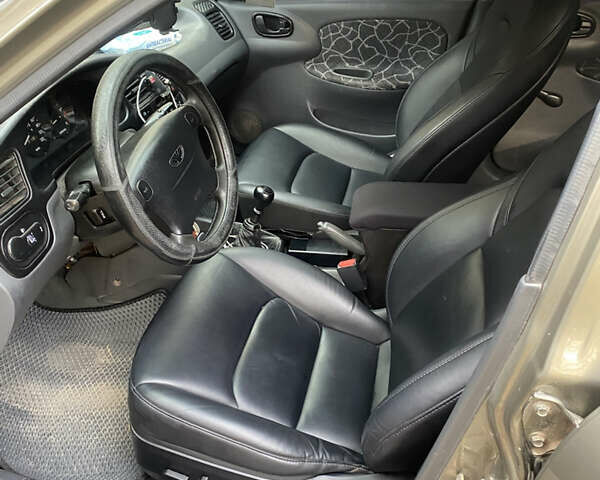 Зеленый Дэу Ланос, объемом двигателя 1.5 л и пробегом 245 тыс. км за 3499 $, фото 4 на Automoto.ua