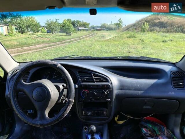 Зелений Деу Ланос, об'ємом двигуна 1.5 л та пробігом 200 тис. км за 1700 $, фото 4 на Automoto.ua