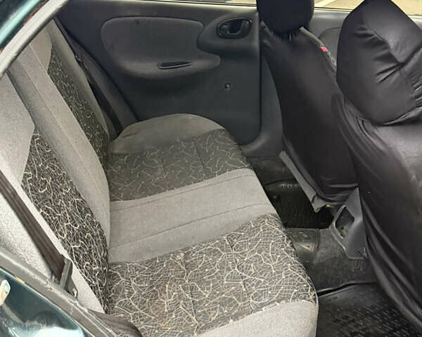 Дэу Ланос 2004 в Софіївська Борщагівка на Automoto.ua Зеленый Дэу Ланос, объемом двигателя 1.6 л и пробегом 193 тыс. км за 1300 $, фото 3 на Automoto.ua