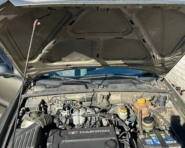 Зеленый Дэу Ланос, объемом двигателя 1.6 л и пробегом 350 тыс. км за 3000 $, фото 5 на Automoto.ua