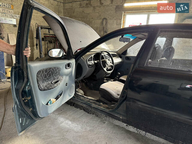 Зеленый Дэу Ланос, объемом двигателя 1.5 л и пробегом 104 тыс. км за 1850 $, фото 3 на Automoto.ua