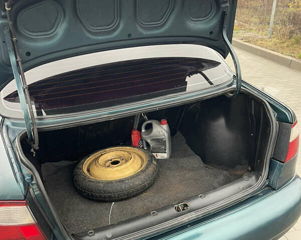 Зелений Деу Ланос, об'ємом двигуна 1.5 л та пробігом 200 тис. км за 1399 $, фото 7 на Automoto.ua