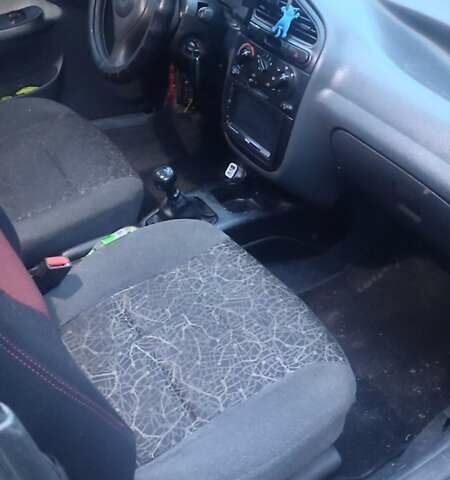 Зеленый Дэу Ланос, объемом двигателя 1.5 л и пробегом 283 тыс. км за 1950 $, фото 2 на Automoto.ua