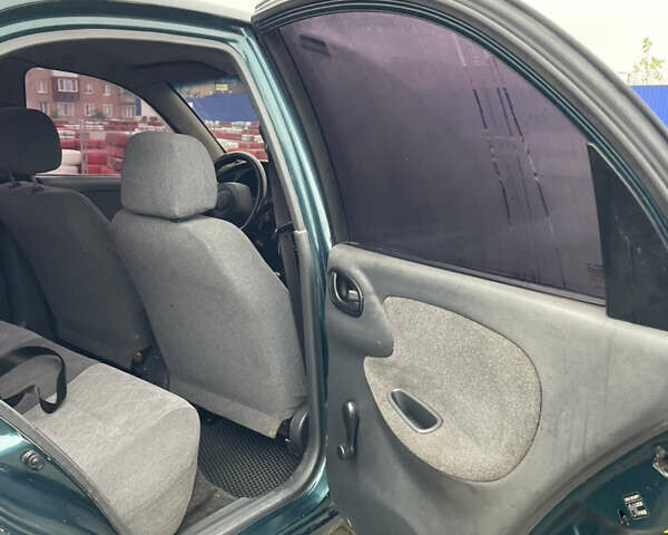 Зелений Деу Ланос, об'ємом двигуна 1.5 л та пробігом 200 тис. км за 1399 $, фото 8 на Automoto.ua