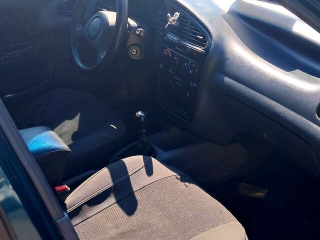 Зеленый Дэу Ланос, объемом двигателя 1.5 л и пробегом 215 тыс. км за 2600 $, фото 4 на Automoto.ua