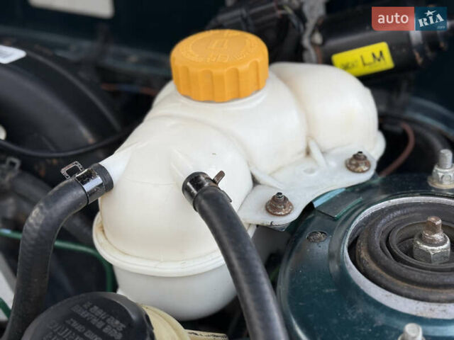 Зелений Деу Ланос, об'ємом двигуна 1.5 л та пробігом 167 тис. км за 2899 $, фото 33 на Automoto.ua