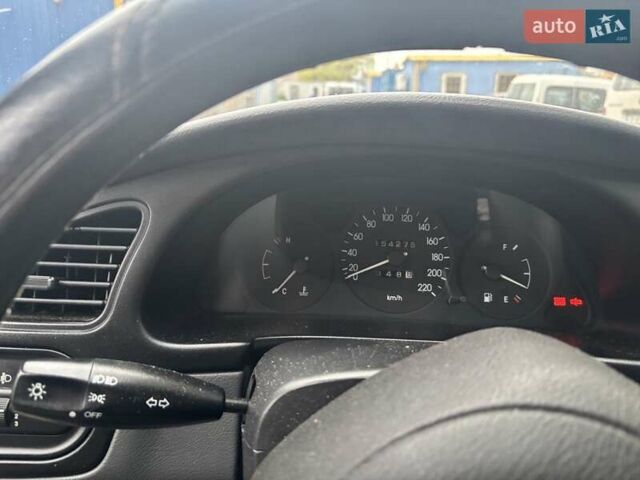 Зеленый Дэу Ланос, объемом двигателя 1.5 л и пробегом 154 тыс. км за 3600 $, фото 3 на Automoto.ua