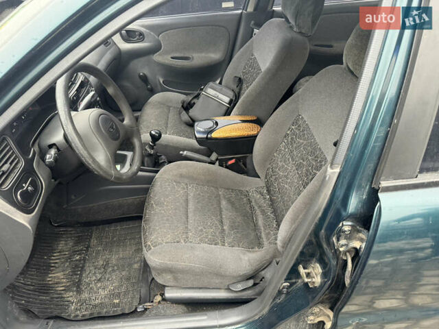 Зелений Деу Ланос, об'ємом двигуна 1.5 л та пробігом 200 тис. км за 999 $, фото 5 на Automoto.ua