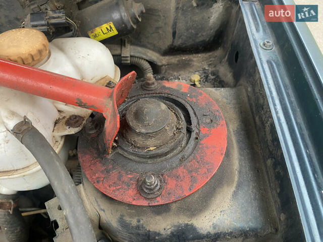 Зеленый Дэу Ланос, объемом двигателя 1.5 л и пробегом 183 тыс. км за 2000 $, фото 9 на Automoto.ua