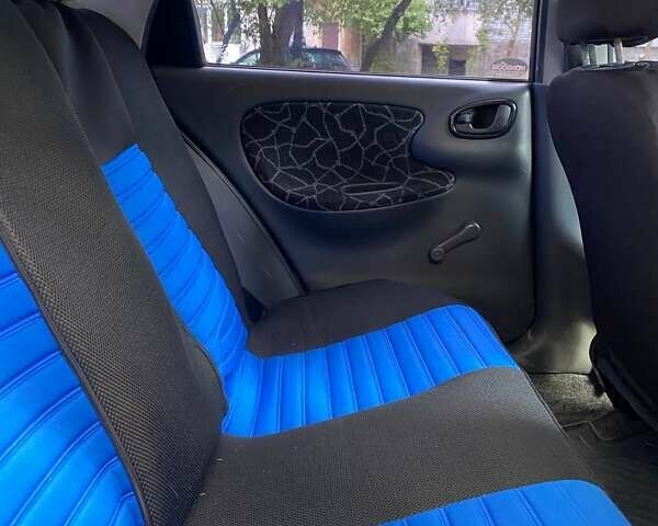 Зелений Деу Ланос, об'ємом двигуна 1.5 л та пробігом 180 тис. км за 2000 $, фото 8 на Automoto.ua