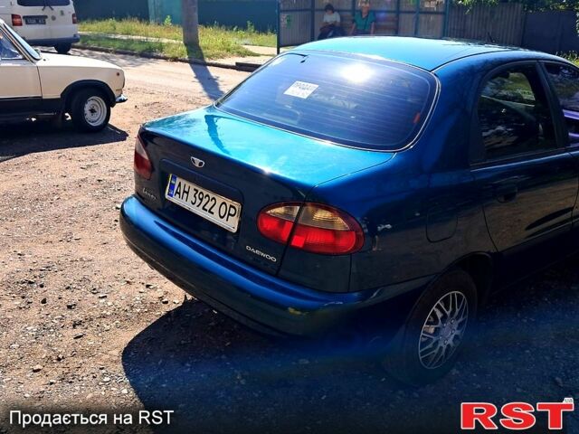 Зеленый Дэу Ланос, объемом двигателя 1.5 л и пробегом 215 тыс. км за 2600 $, фото 2 на Automoto.ua