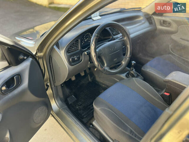 Зеленый Дэу Ланос, объемом двигателя 1.6 л и пробегом 221 тыс. км за 2500 $, фото 11 на Automoto.ua