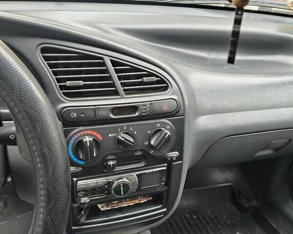 Деу Ланос 2004 у Кривому Розі на Automoto.ua Зелений Деу Ланос, об'ємом двигуна 1.5 л та пробігом 184 тис. км за 3100 $, фото 2 на Automoto.ua