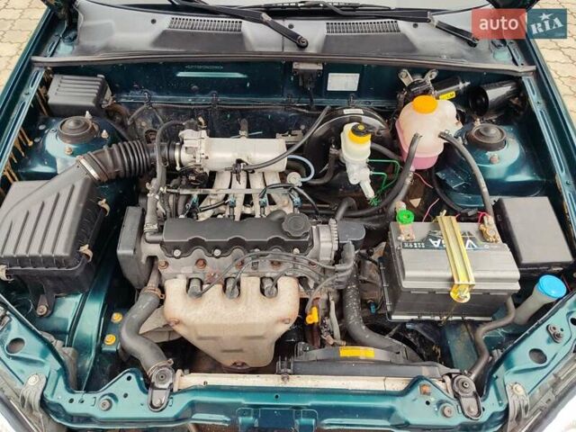 Зеленый Дэу Ланос, объемом двигателя 1.5 л и пробегом 185 тыс. км за 2750 $, фото 12 на Automoto.ua