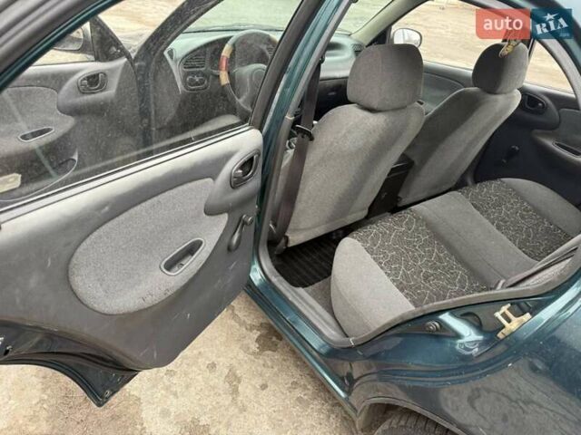 Зеленый Дэу Ланос, объемом двигателя 1.5 л и пробегом 250 тыс. км за 2900 $, фото 12 на Automoto.ua