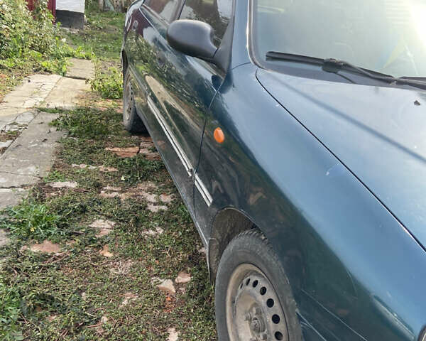 Зелений Деу Ланос, об'ємом двигуна 1.6 л та пробігом 225 тис. км за 1700 $, фото 3 на Automoto.ua