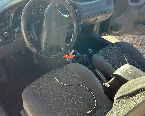 Зеленый Дэу Ланос, объемом двигателя 1.6 л и пробегом 350 тыс. км за 3000 $, фото 6 на Automoto.ua