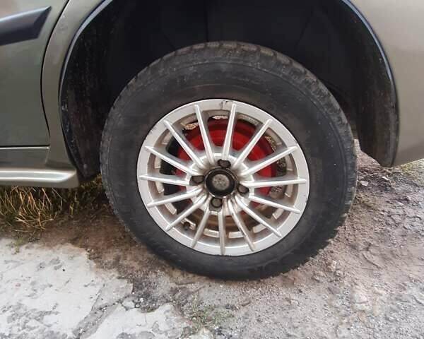 Зеленый Дэу Ланос, объемом двигателя 1.5 л и пробегом 222 тыс. км за 2600 $, фото 11 на Automoto.ua