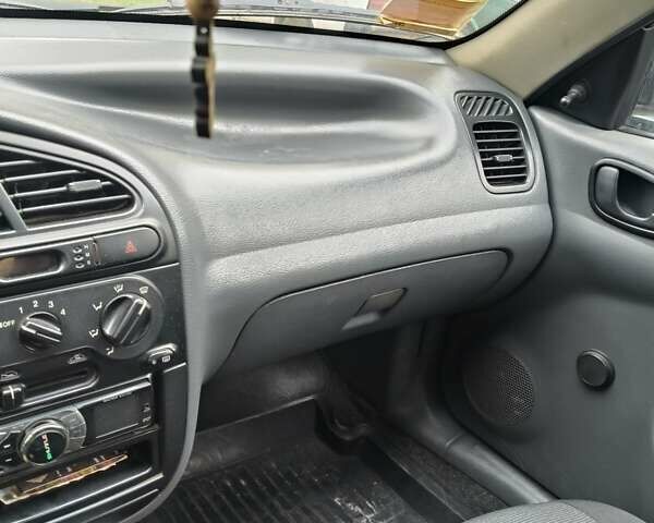 Деу Ланос 2004 у Кривому Розі на Automoto.ua Зелений Деу Ланос, об'ємом двигуна 1.5 л та пробігом 184 тис. км за 3100 $, фото 12 на Automoto.ua