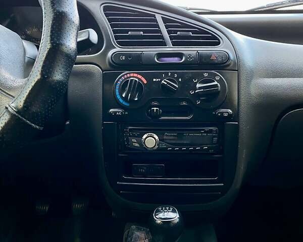 Зелений Деу Ланос, об'ємом двигуна 1.5 л та пробігом 257 тис. км за 2400 $, фото 14 на Automoto.ua