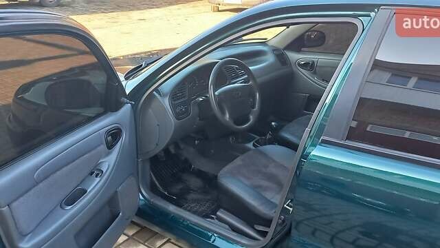 Зелений Деу Ланос, об'ємом двигуна 1.5 л та пробігом 300 тис. км за 4200 $, фото 9 на Automoto.ua